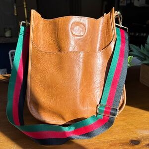 Elegant Tan Messenger Bag with Multicolor Strap